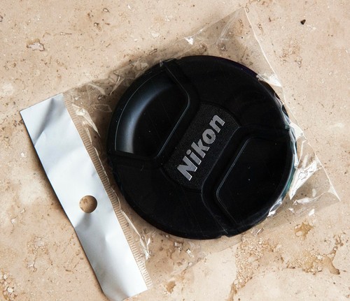Due nikon tappi - due,